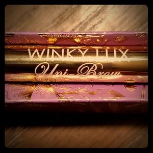 Winky Lux Uni-Brow